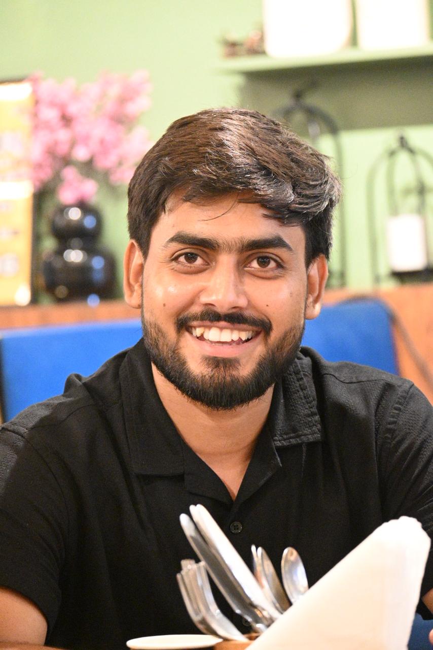 Elevio Media founder smiling for a portrait